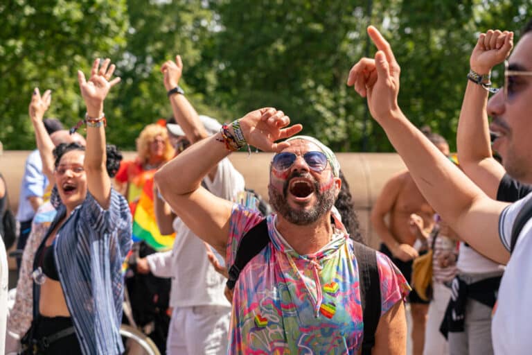 London Pride 2024 crowd singing with their hands in the air