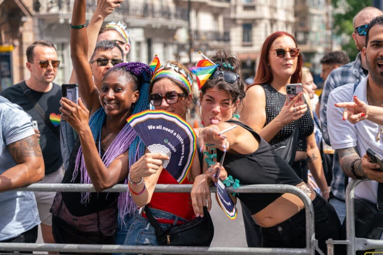 London Pride 2024 crowd smiling and cheering